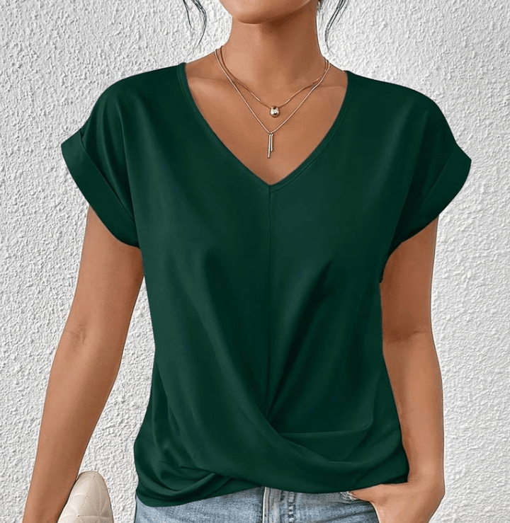 Women's flattering V-neck long-sleeve top for chic everyday wear. Comfortable & versatile fashion.