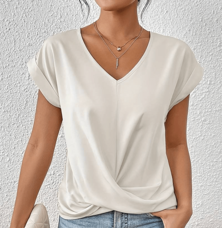 Stylish women's V-neck top with a flattering silhouette. Chic long-sleeve for comfortable fashion & versatility.
