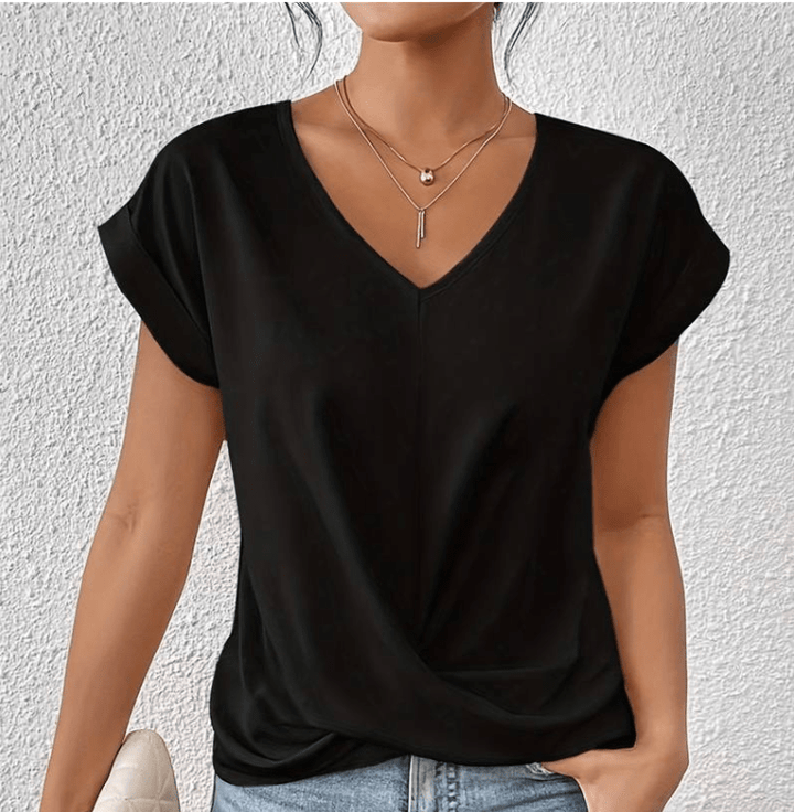 Fashionable V-neck women's top with a flattering fit, perfect for comfortable & versatile everyday style.