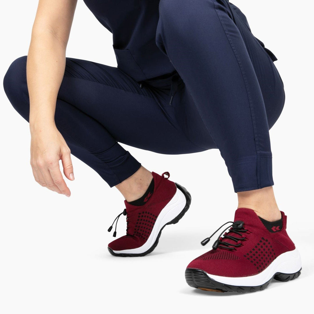 Women's FlexiComfort sneakers, engineered for optimal support during walks & daily activities.
