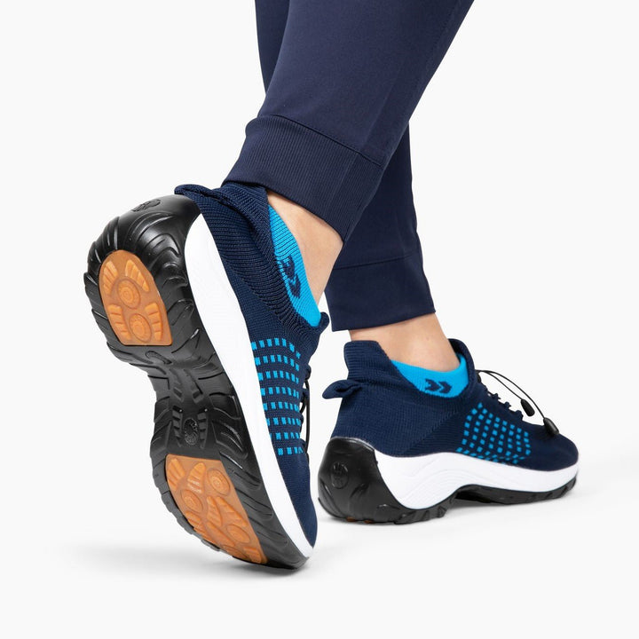 Breathable FlexiComfort women's sneakers, keeping feet cool & comfortable all day.