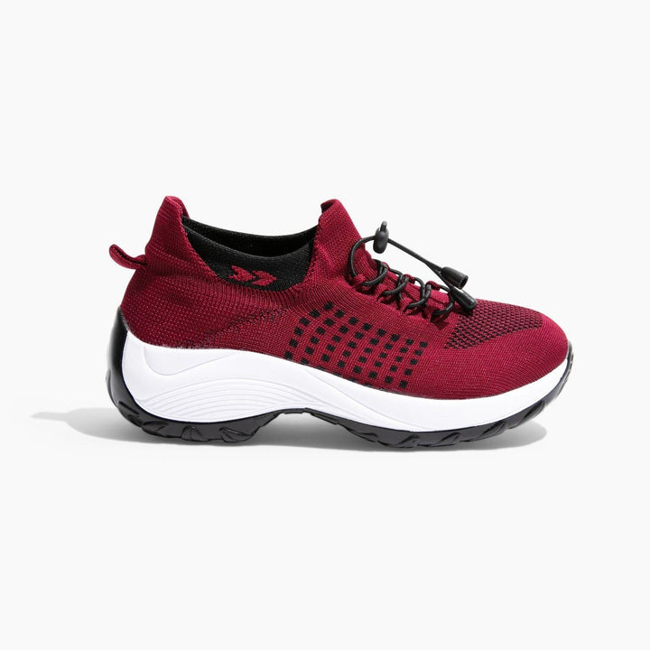 Supportive FlexiComfort women's sneakers, ideal for running, walking, & casual style.