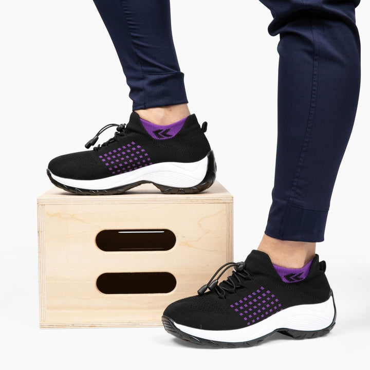 Lightweight women's FlexiComfort sneakers, offering responsive cushioning & superior support.