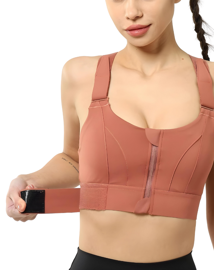 Adjustable FlexiFit sports bra for women. High-support design with front zip, great for yoga and workouts.