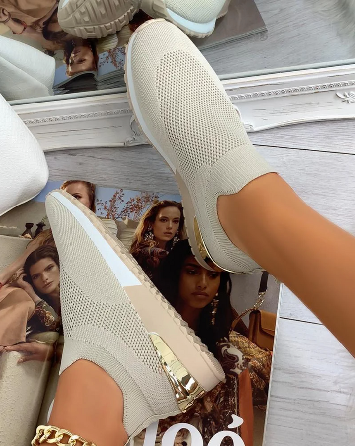 Modern women's slip-on sneakers. Easy wear, versatile athleisure shoes perfect for casual daily walking.
