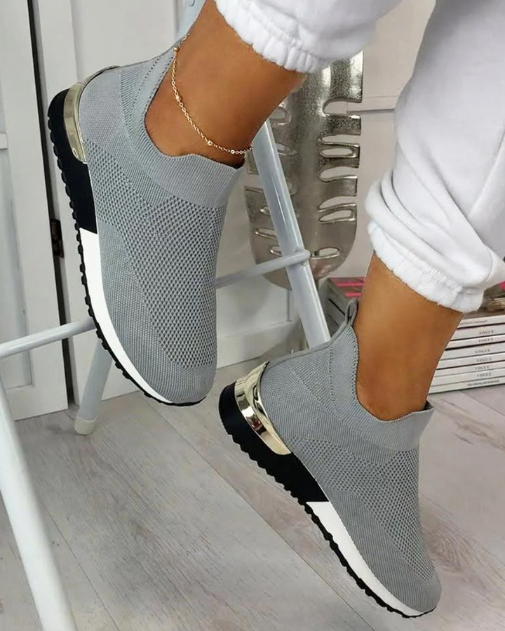Women's casual slip-on sneakers. Modern design, easy wear, flexible & comfortable for everyday walking.