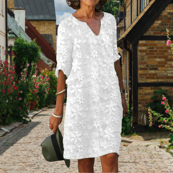 Women's floral appliqué midi dress with notch neck & 3/4 sleeves, perfect for casual summer style.