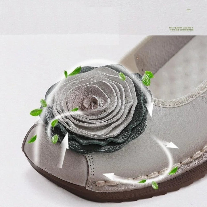 Floral appliqué slip-on loafers for women, offering comfortable footwear and chic everyday style.