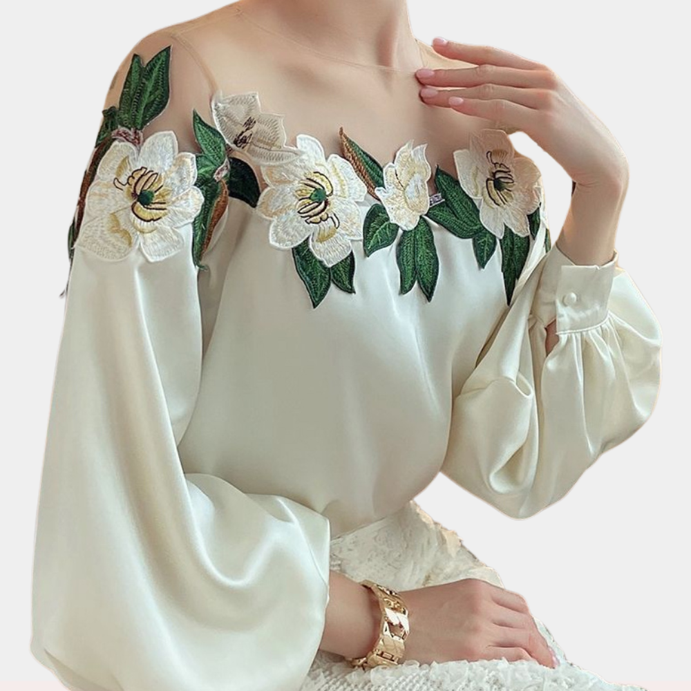 Elegant beige women's blouse with floral print, loose fit and long sleeves