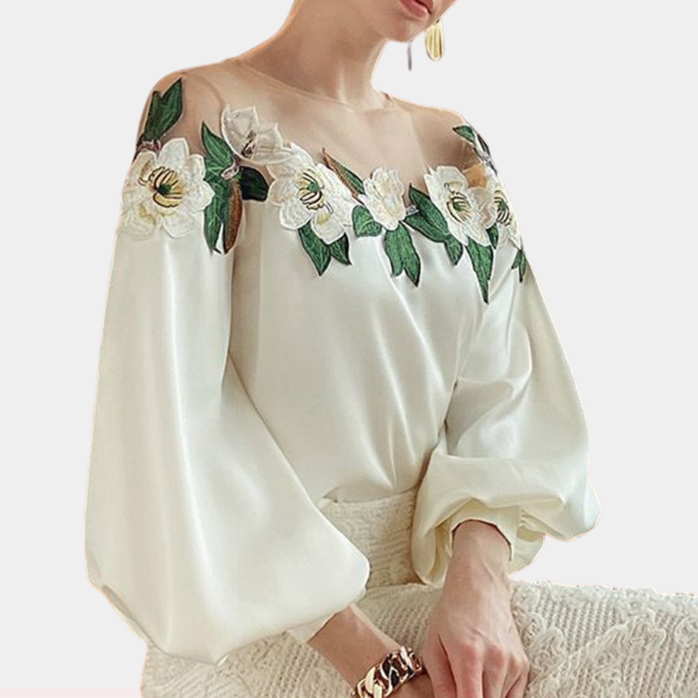 Loose fit beige women's long sleeve blouse with delicate floral pattern