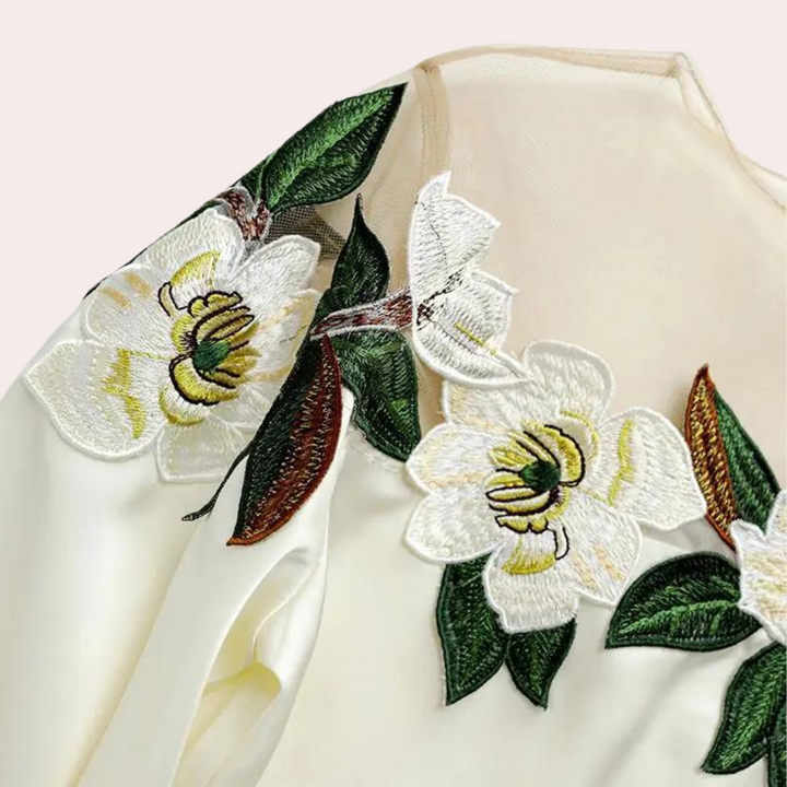 Women's spring blouse: loose fit, beige with floral design, long sleeves