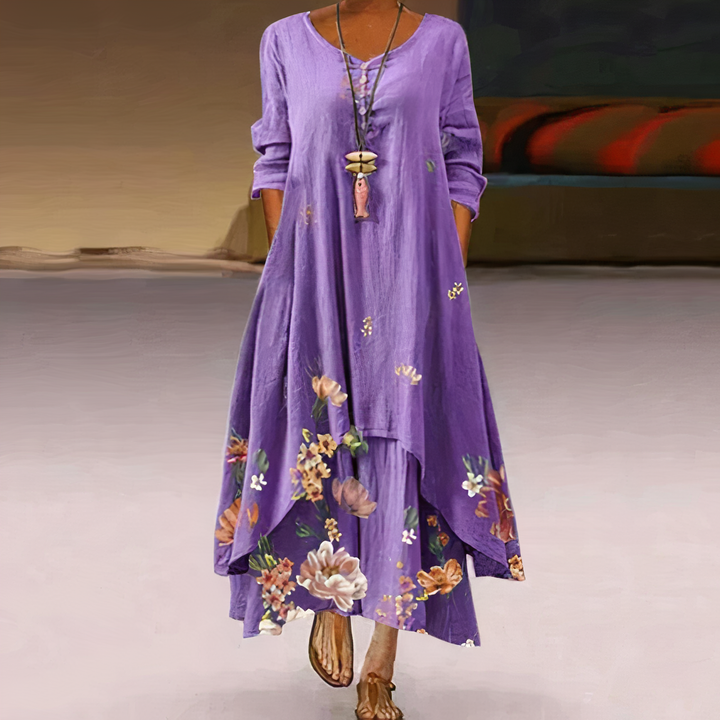 Comfortable flowy oversized maxi dress with elegant floral border print and long sleeves for women.