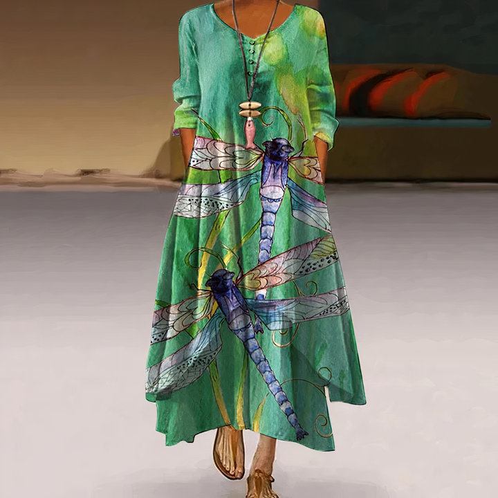 Women's comfortable long sleeve V-neck floral maxi dress. Oversized, flowy, and perfect for elegant casual style.