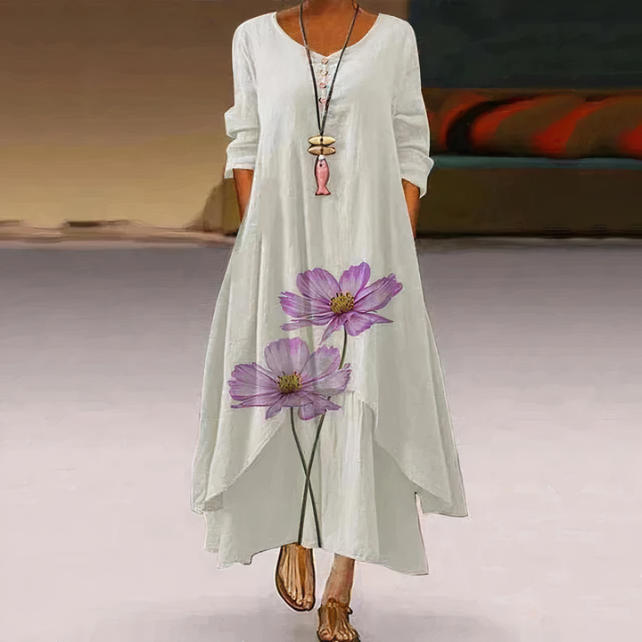 Detailed floral border print on a women's oversized long sleeve maxi dress with a flattering V-neck.