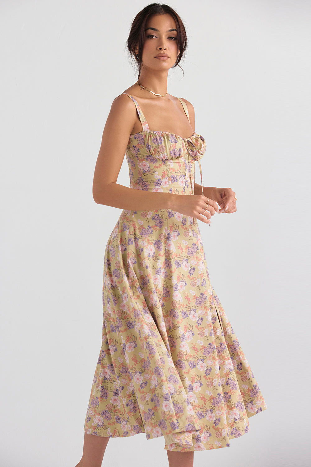 Elegant women's floral summer dress, a bustier design with a striking lace-up back.