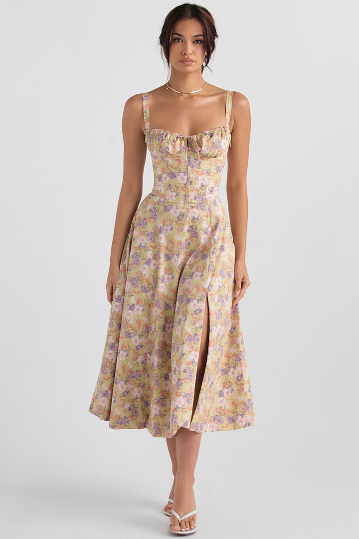 Isabella floral bustier summer dress, sleeveless with a waist cinching silhouette.