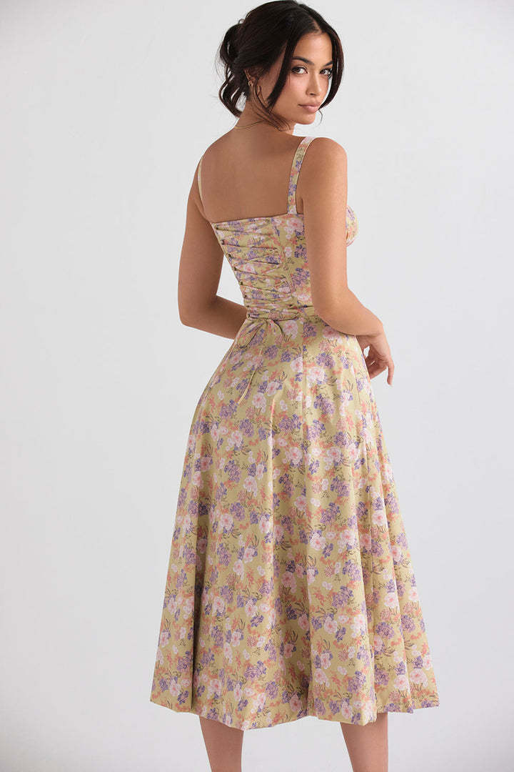 Sweetheart neckline bustier dress with vibrant floral print & flattering waist cinching.