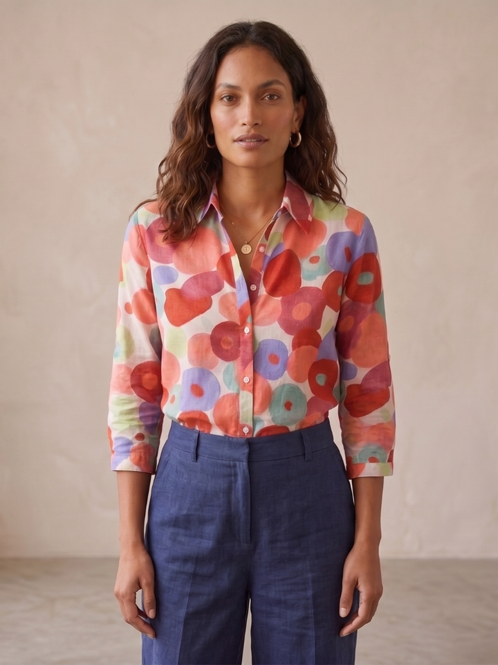 Stylish relaxed fit women's floral top, a chic button-down blouse perfect for casual wear or office fashion.
