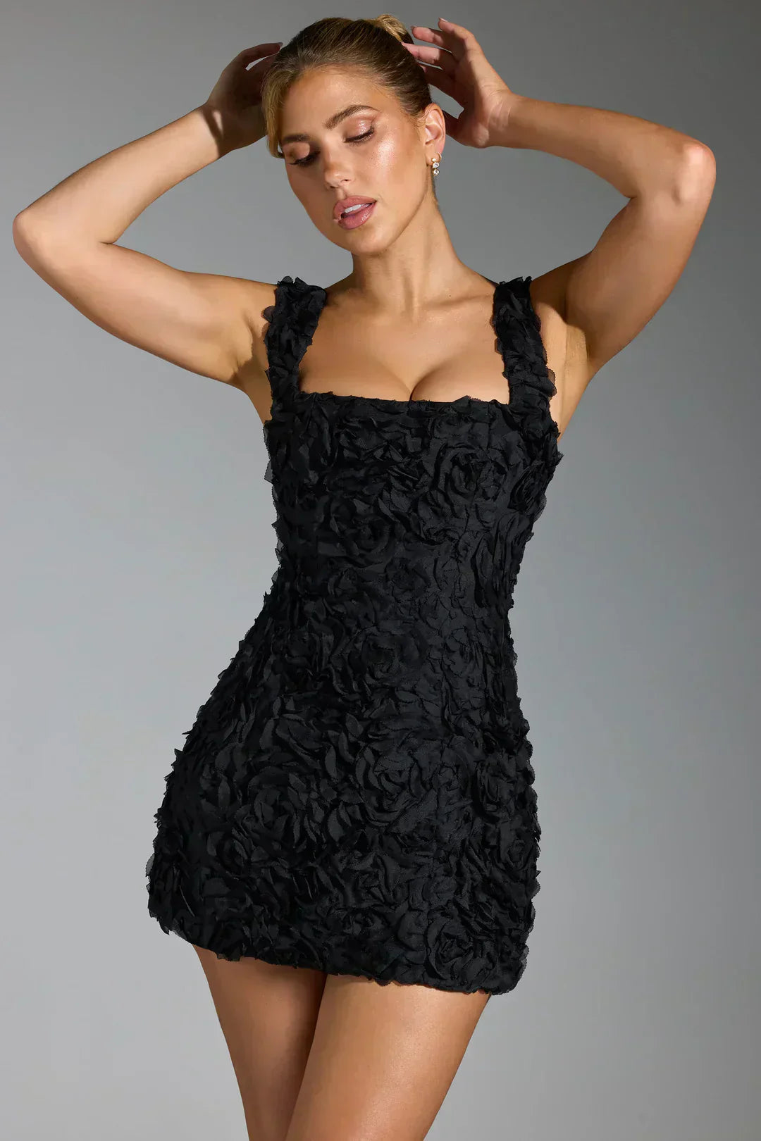 Fashionable women's floral bodycon mini dress, detailed with a trendy corset top