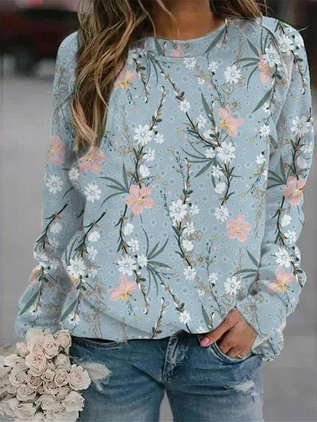 Women's elegant floral crew neck sweatshirt, cozy long sleeve top. Ideal for fall and winter style.