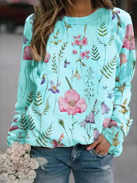 Comfortable women's floral crew neck sweatshirt. Long sleeve, oversized, boho chic for fall/winter fashion.