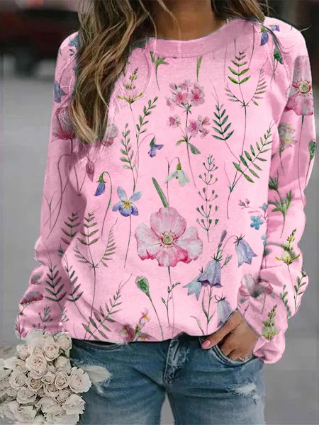 Stylish women's floral crew neck sweatshirt, oversized fit. Ideal for winter fashion & cozy layering.