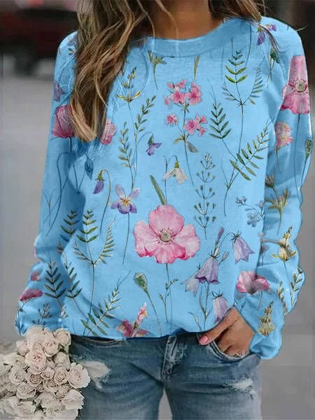 Trendy women's floral crew neck sweatshirt, soft fabric. Perfect for stylish and comfortable outfits.