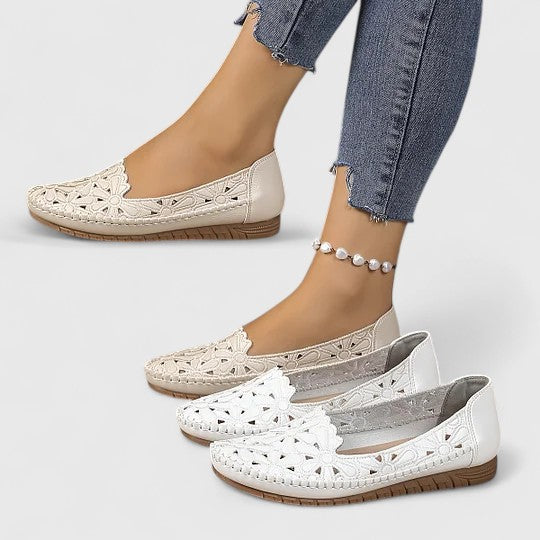 Women's floral cutout slip-on ballet flats, comfortable & stylish for everyday wear.