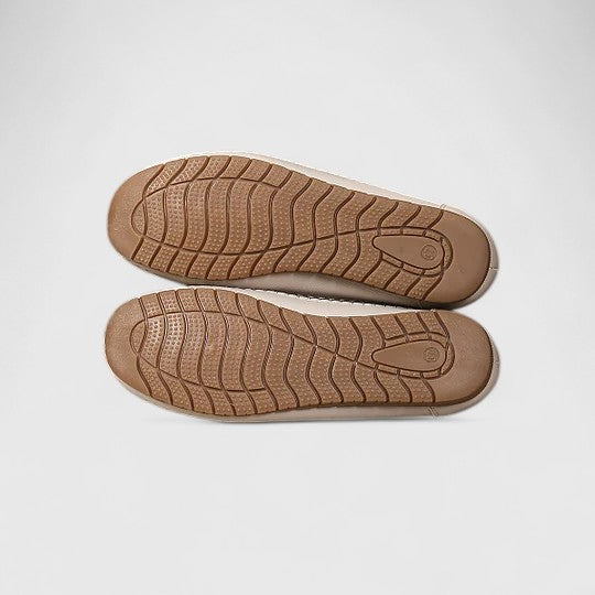 Soft & comfortable women's ballet flats, featuring chic floral cutouts and a convenient slip-on design.