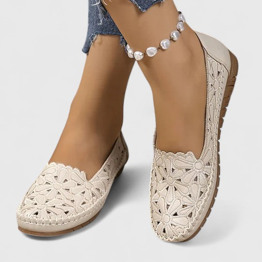 Casual elegance in women's floral cutout slip-on ballet flats, ideal for feminine everyday wear.