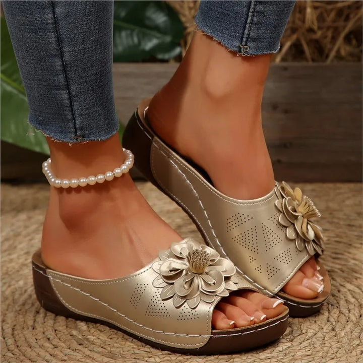 Experience summer bliss with women's floral Elarie comfort slides & style.