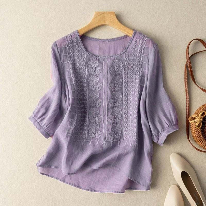 Elegant women's long-sleeve floral embroidered blouse; perfect for spring & summer casual outfits.