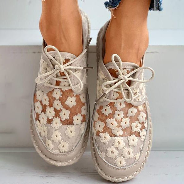 Supportive women's footwear featuring beautiful floral embroidery and a comfortable arch design.