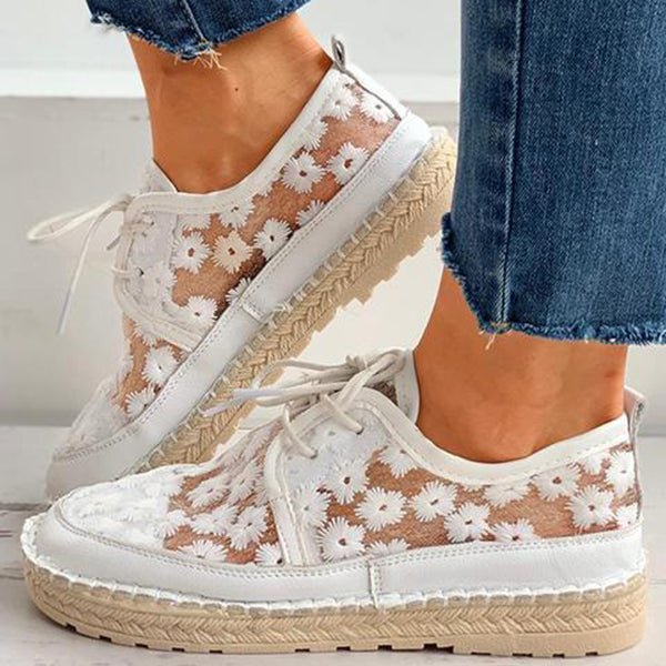 Detailed floral embroidered women's comfort shoes, designed for all-day wear with arch support.