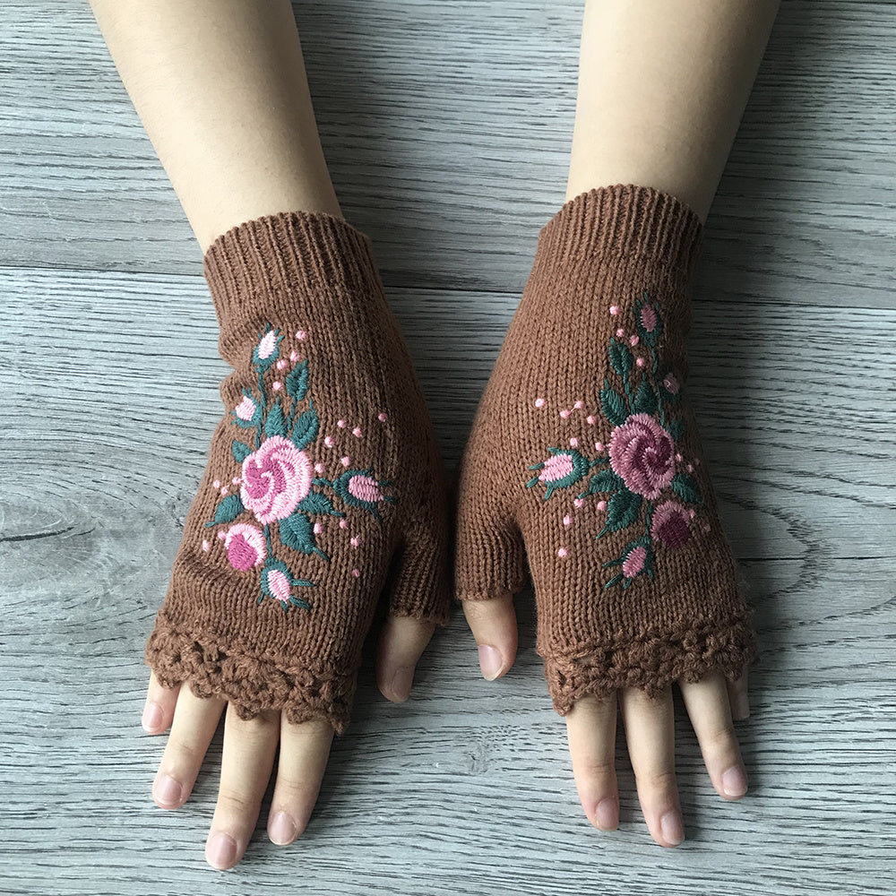 Pair of women's knit fingerless gloves, showcasing detailed floral embroidery, ideal for cold weather.