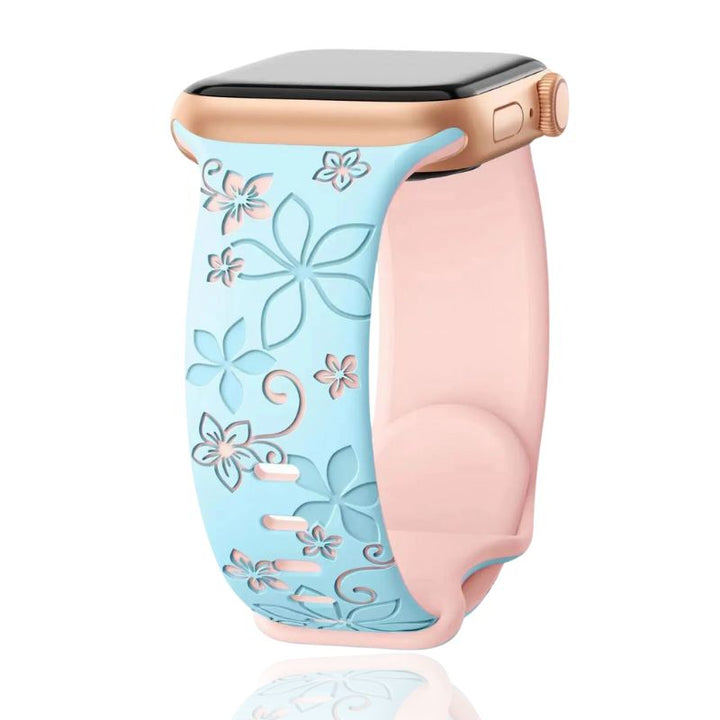 Elegant women's floral engraved silicone smartwatch band. A stylish accessory with intricate design.