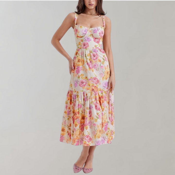 Close-up of the floral pattern on a women's flared midi dress, made from polyester