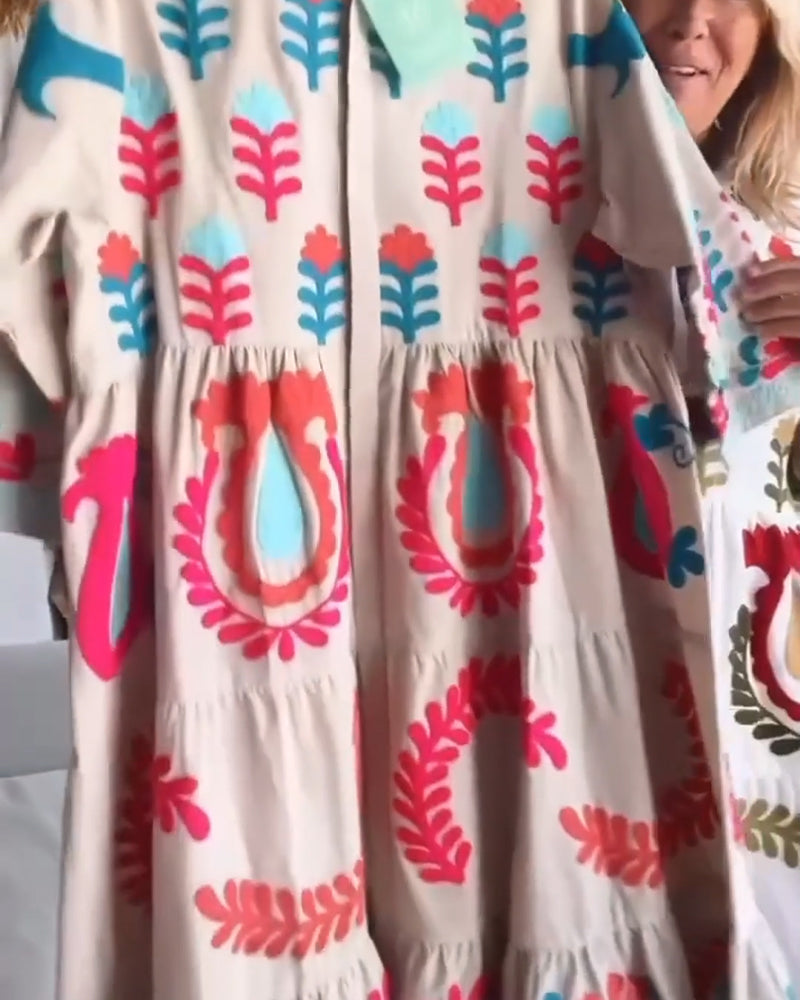 Casual women's floral graphic midi dress, flowy and comfortable for everyday summer wear.