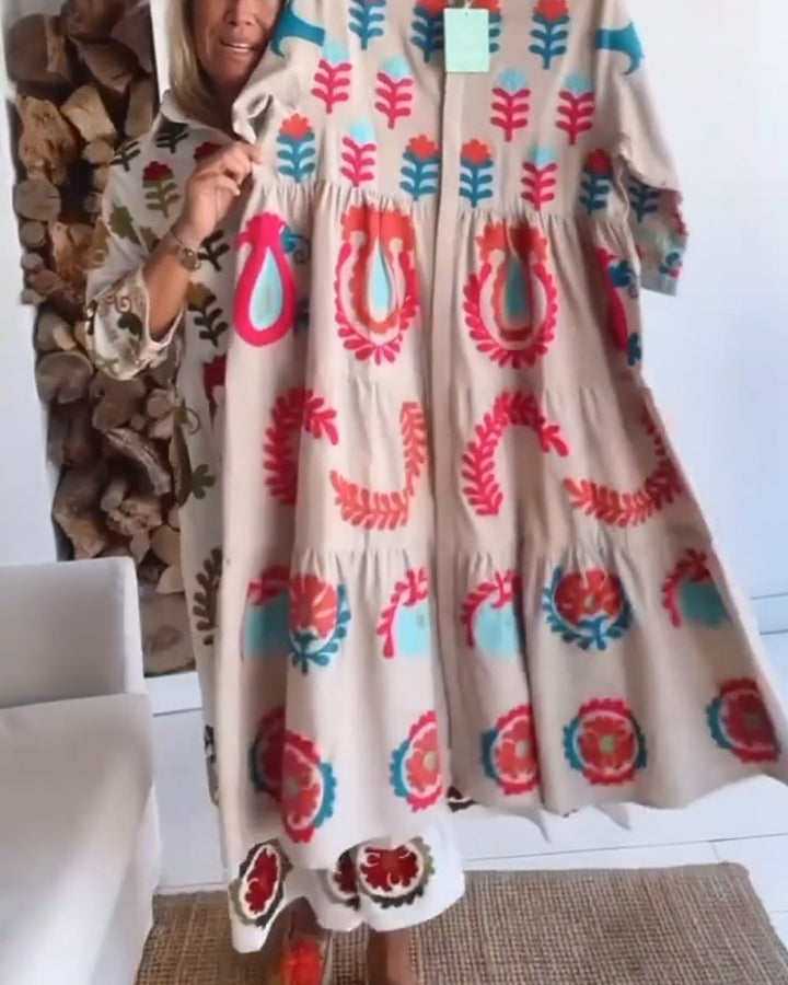 Relaxed fit women's floral midi dress with a stylish graphic print, great for day wear.