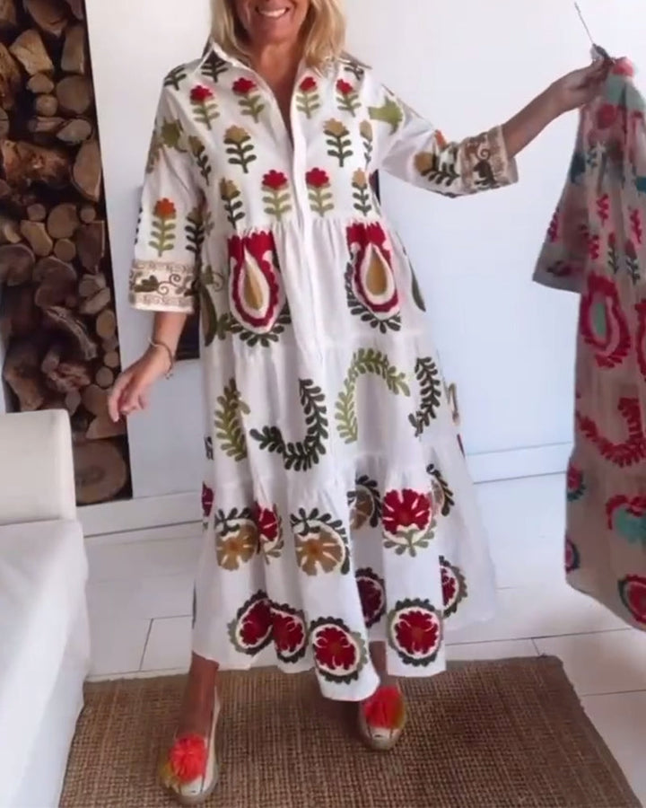 A-line women's midi dress featuring beautiful floral graphic print, relaxed and elegant.