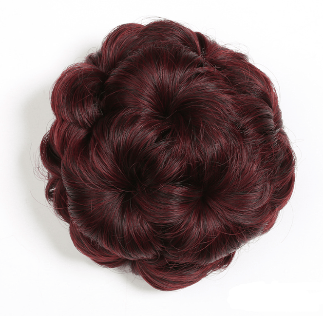 Get a stunning updo with this floral hair clip & synthetic hair extension.