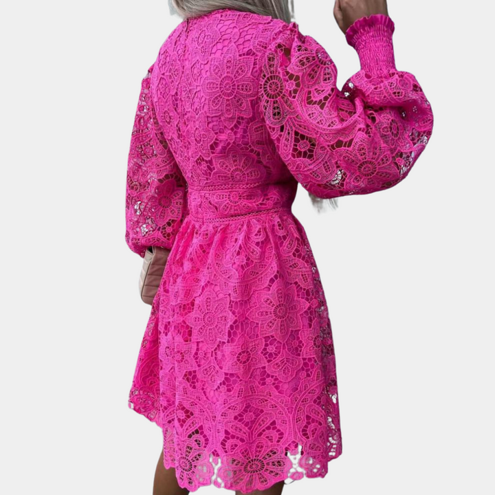 Casual chic women's midi dress featuring floral lace, V-neck, long sleeves, and ruffle waist detail.