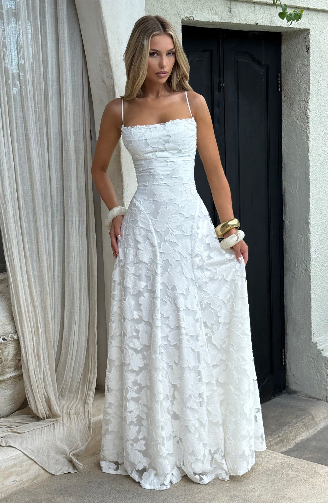 Stylish women's party maxi dress, floral print, featuring a waterfall neckline and lace-up back.