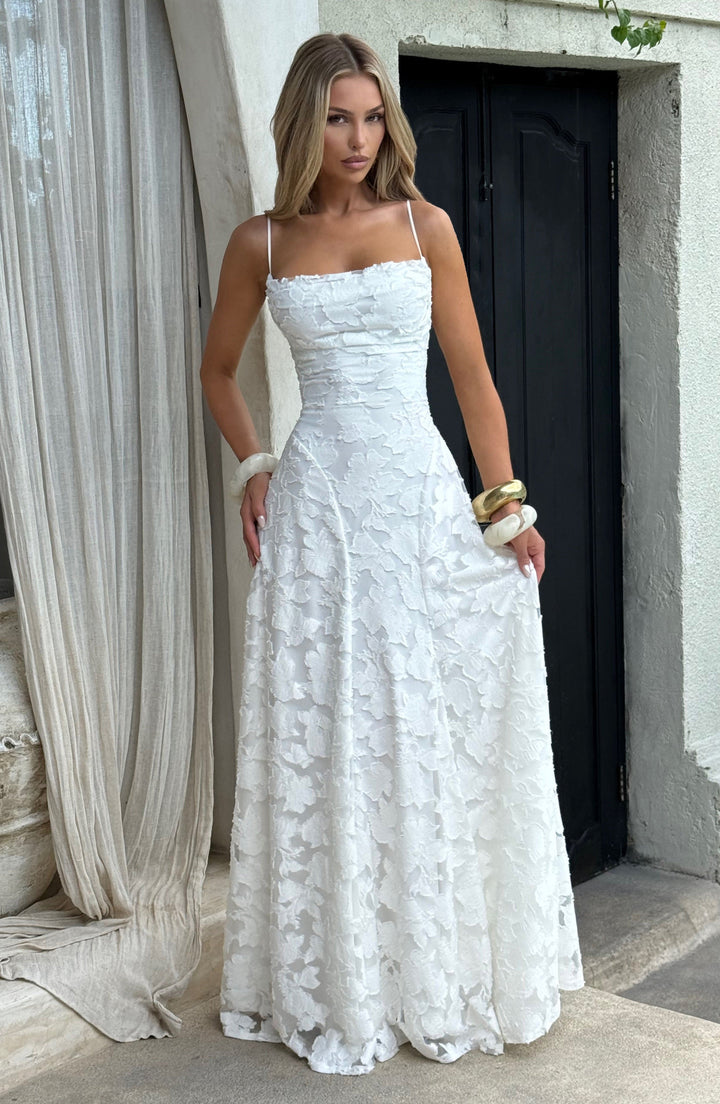 Stylish women's party maxi dress, floral print, featuring a waterfall neckline and lace-up back.