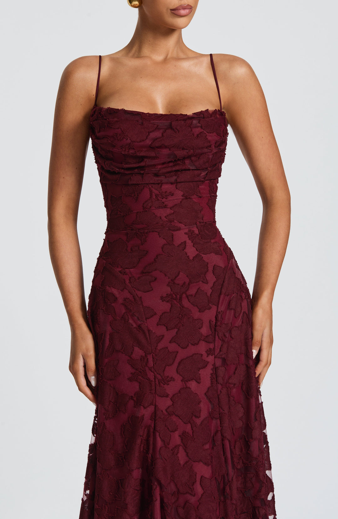 Vibrant floral print maxi dress for women, with a flattering waterfall neckline and lace-up back.