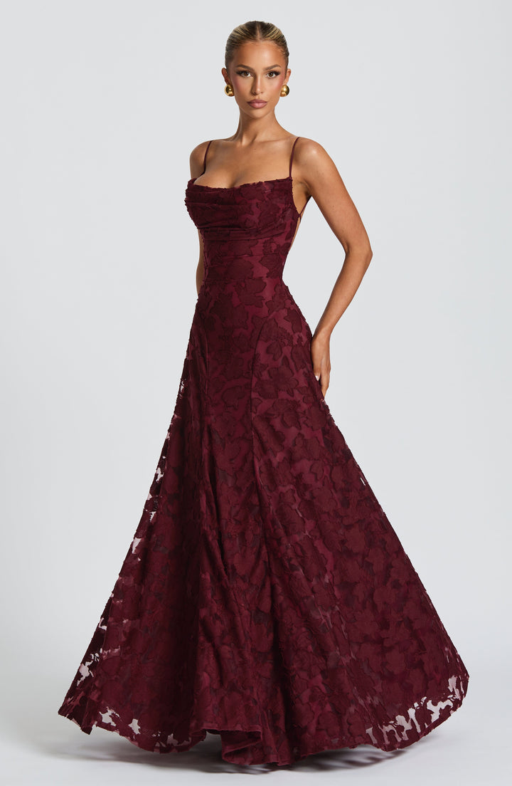 Chic women's maxi dress, floral print, waterfall neckline, and lace-up back, perfect for any event.