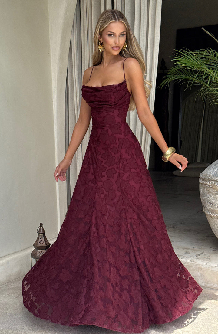 Versatile women's floral maxi dress, suitable for summer, evening, or party wear with unique back.