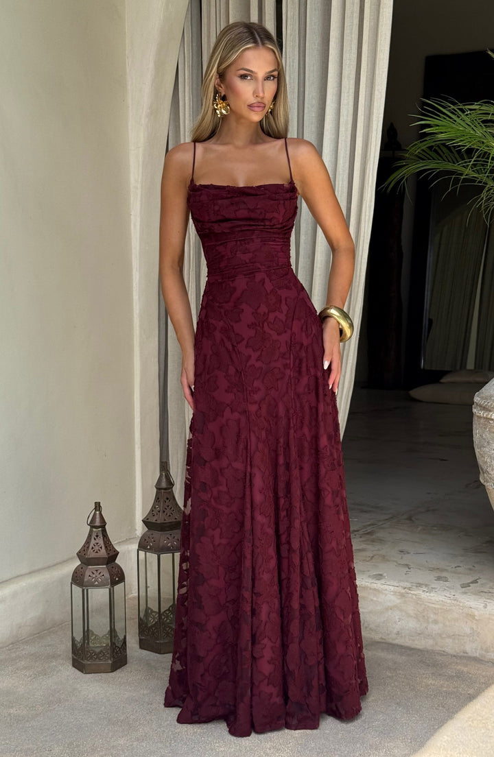 Fashionable women's floral maxi dress, a stunning A-line design with a waterfall neck & lace-up back.