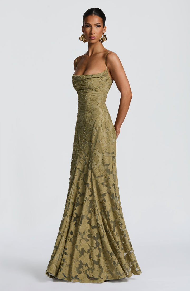 Sleeveless floral maxi dress for women with an A-line silhouette, waterfall neck, and lace-up back.