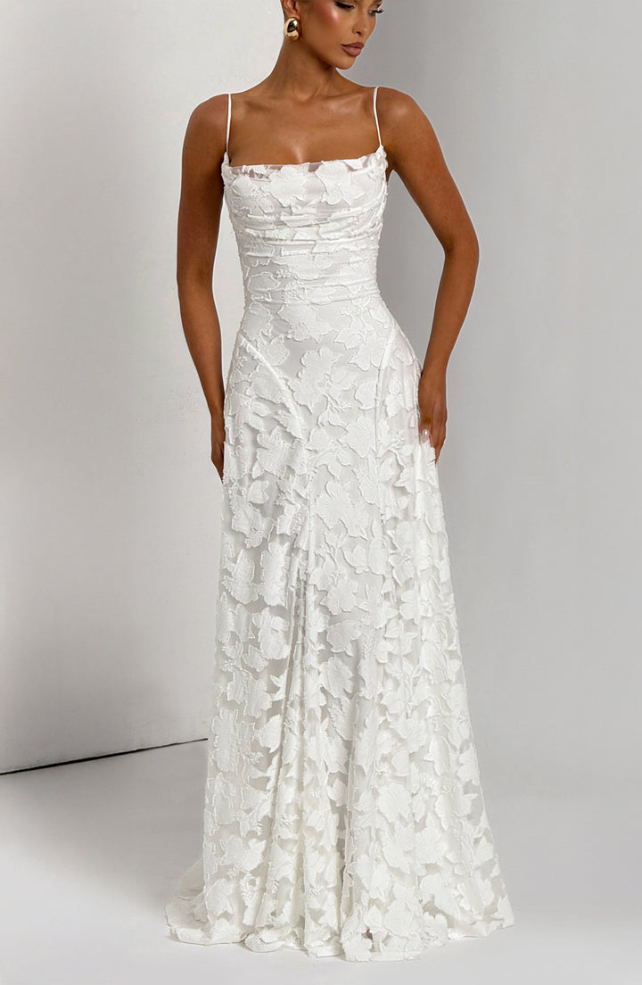 Close-up of the elegant waterfall neckline on a women's floral maxi dress.